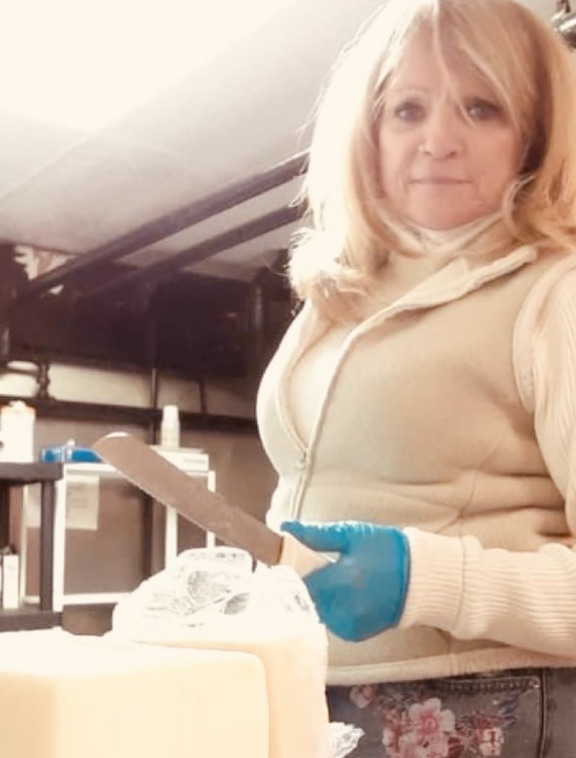 Sue preparing sandwiches for participants in the PPP kitchen.