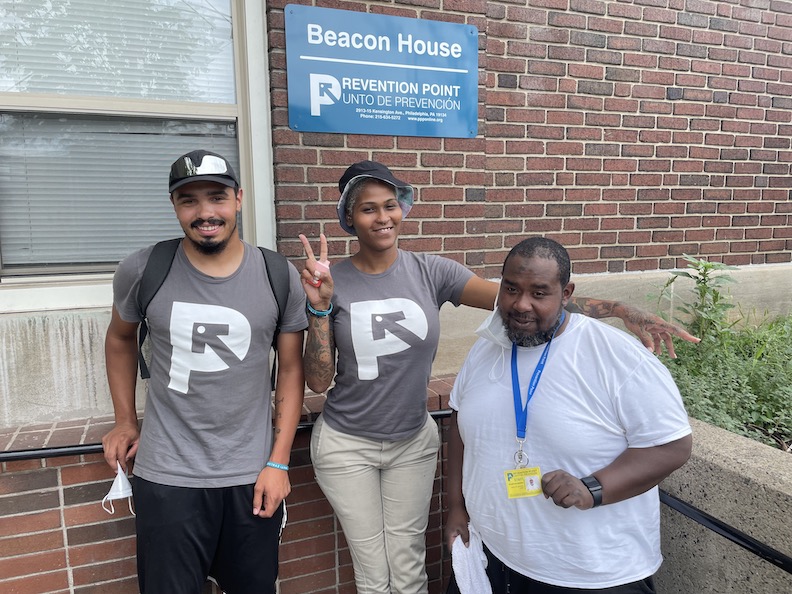 staff in front of beacon